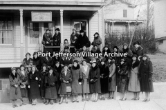 members of the Suwassett Garden Club stand in front of Post 432, American Legion, Wilson Ritch Post, on East Main-adjacent to the Baptist Church