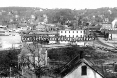 View of West Broadway. Loper Brothers. Flour Mill. Photo #32 by Arthur S. Greene.
